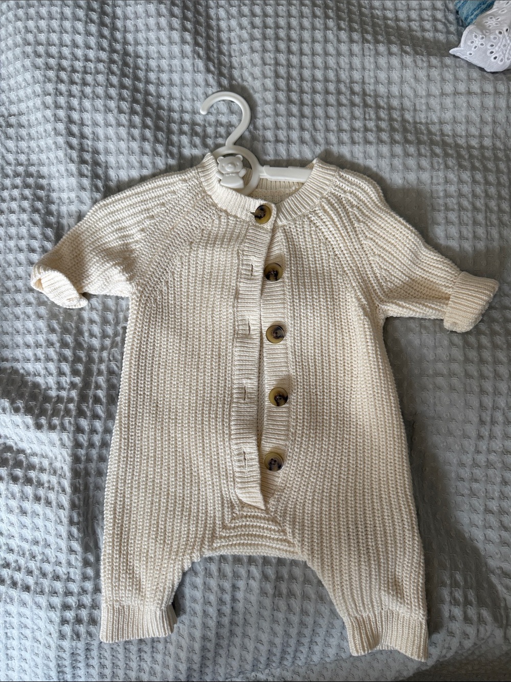 Amazon Essentials x Sofia Grange Cream Knit Button-Front Baby One-Piece